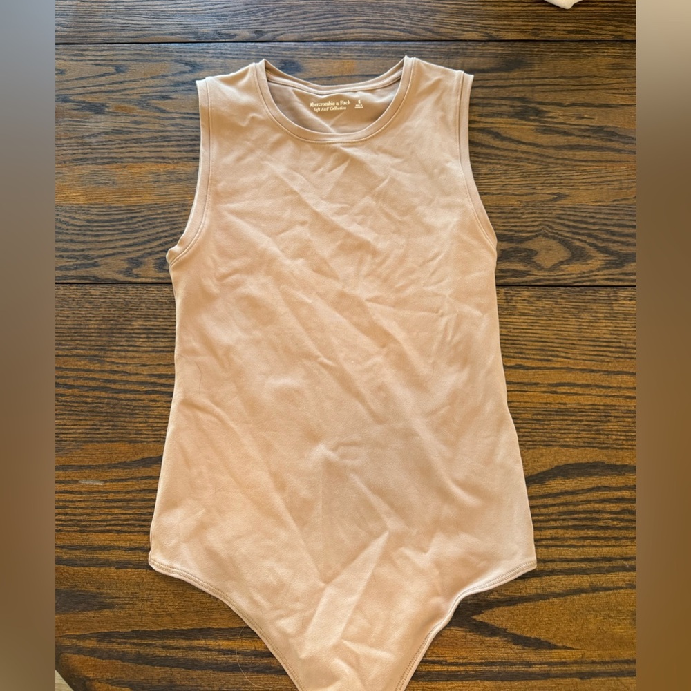Beige Abercrombie bodysuit. Only one a few times perfect condition.